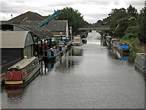TQ0483 : The Grand Union Canal south of the Rockingham Road bridge by Mike Quinn
