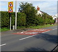 Warning signs alongside the A485, Peniel, Carmarthenshire