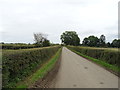 SP2343 : Lane heading south near New Bridges Farm by JThomas