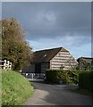 Flint-built barn at Iford Farm