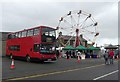 SH5738 : Sightseeing bus and a big wheel by Gerald England