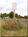 TL9228 : Fordham Village sign by Geographer