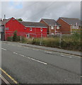 Fenced-off waste ground in Buckley