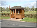 TL9033 : Bus Shelter on the B1508 Colchester Road by Geographer