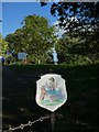 Arms of Devon County Council at the entrance to their office grounds