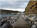 NZ7818 : Path along western edge of Staithes harbour by habiloid
