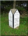 Milepost beside the A477