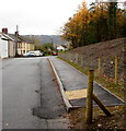 Pavement below a grassless bank, Pentwyn, Torfaen