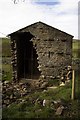 Field barn damaged by flash flooding, Faggergill Bridge