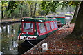 Moored trip boat ?Rosebud? by the Canal Centre at Mytchett