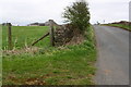 NX9920 : Minor road approaching crossroads at High Farm by Luke Shaw