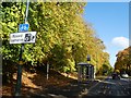 Bus shelter and autumn colour, by Manor Farm Park