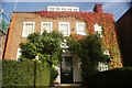 View of autumn leaves on a house on Abbotsbury Road