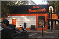View of Mister Pumpernink pizza restaurant on the corner of Holland Park Avenue and Portland Road