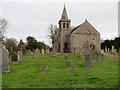 Kettins Parish Church and part of its burial ground