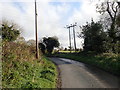 11kV power lines crossing the Srib Road near the village of Drumaroad