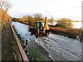 TL4279 : JCB on The Causeway at Sutton Gault - The Ouse Washes by Richard Humphrey