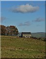 Under a cloud - view of a barn at Clough Head