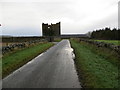 NJ6958 : Wall enclosed road approaching the remains of Eden Castle by Peter Wood