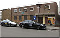 Taxis parked outside a church, South Loudoun Place, Butetown, Cardiff