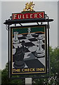 Sign for the Check Inn, North Wroughton, Swindon