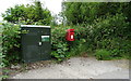 Elizabeth II postbox and Openreach fibre cabinet on Enford Hill, Enford