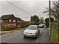 Cars and houses on New Farm Road