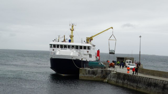 Off loading cars from MV Earl Sigard at North Ronaldsay North Ronaldsay is the only inhabited island in the Orkney Islands where vehicles need to be craned off and on.