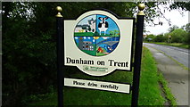 SK8174 : Dunham-on-Trent village sign, A57 westbound by Colin Park