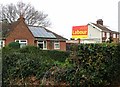 TG3104 : General election "Vote Labour" poster on The Street by Evelyn Simak