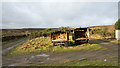 NZ0150 : Trailers used as wood stores by Trevor Littlewood