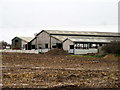 SJ5461 : Barns at Ferney Lees by John H Darch
