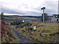 NG4249 : Signposted path in Peinmore by Richard Dorrell