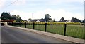 Ornamental iron fence and topiary hedge at bungalow on the Faughillotra Road