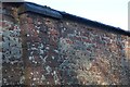 Lichen covered brickwork