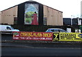 Banners and mural on the south side of Brecon Road, Abergavenny