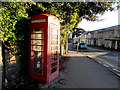 Grade II Listed red phonebox on an  Abergavenny corner