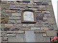 Plaque on the wall of the Montessori Playschool, Richmond