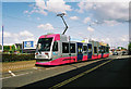 Midland Metro tram no. 09 approaching The Royal tram stop, Bilston Road, Wolverhampton