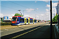 Midland Metro tram no. 08 approaching The Royal tram stop, Bilston Road, Wolverhampton