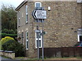 TL3990 : Roadsigns on the B1093 High Street by Geographer