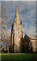 The south side of the tower and spire of the church of St Michael & All Angels, Torrington