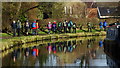 Walking group on towpath of Macclesfield Canal, Bollington