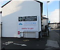 H.Shackleton Pharmacy name on a Brecon Road side wall, Abergavenny