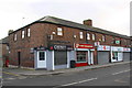 NY3855 : Shops on Wigton Road at road junction by Luke Shaw