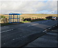 X8 bus stop alongside the A4109 in Pantyffordd