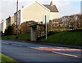 X8 bus stop and stone shelter in Pantyffordd