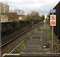 Signs near the NW end of Cardiff Bay station