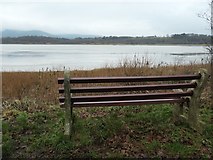 NX9967 : Bench with a view of the Nith estuary by Christine Johnstone