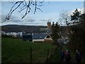 The tower of Buckfast Abbey and the buildings of Buckfast